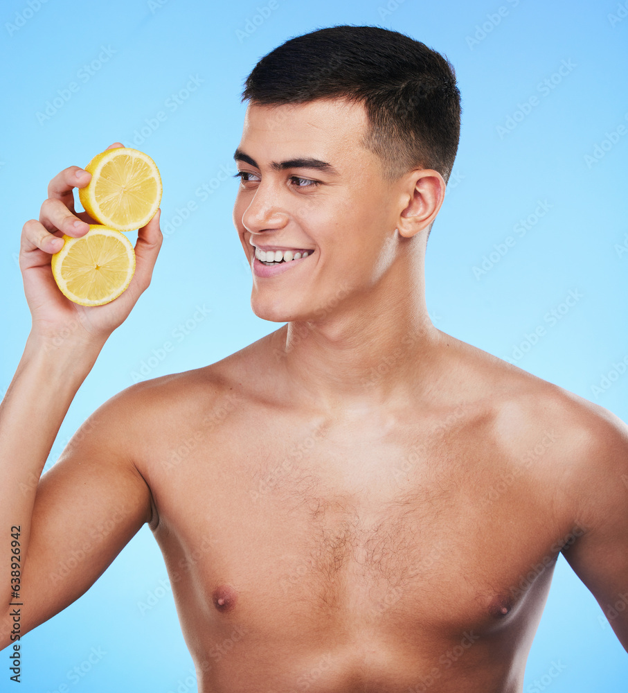 Beauty, smile and skincare with man and lemon in studio for health, detox and natural cosmetics. Vit