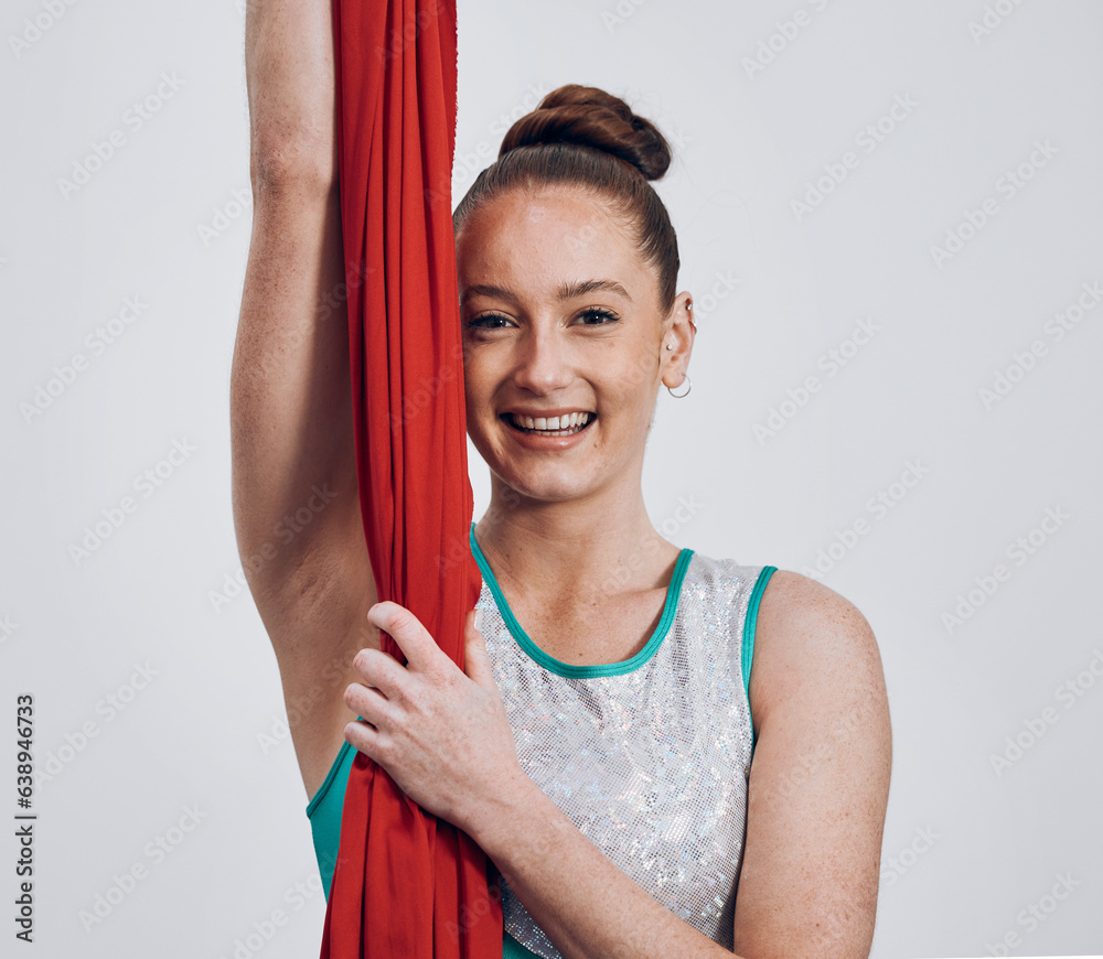 Portrait, ribbon dancer and competition with a woman in studio on a gray background for routine trai