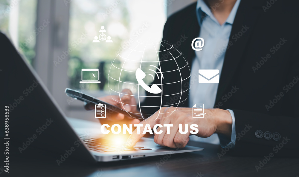 Communication and Contact us or Customer support hotline people connect. Hand using a laptop and tou