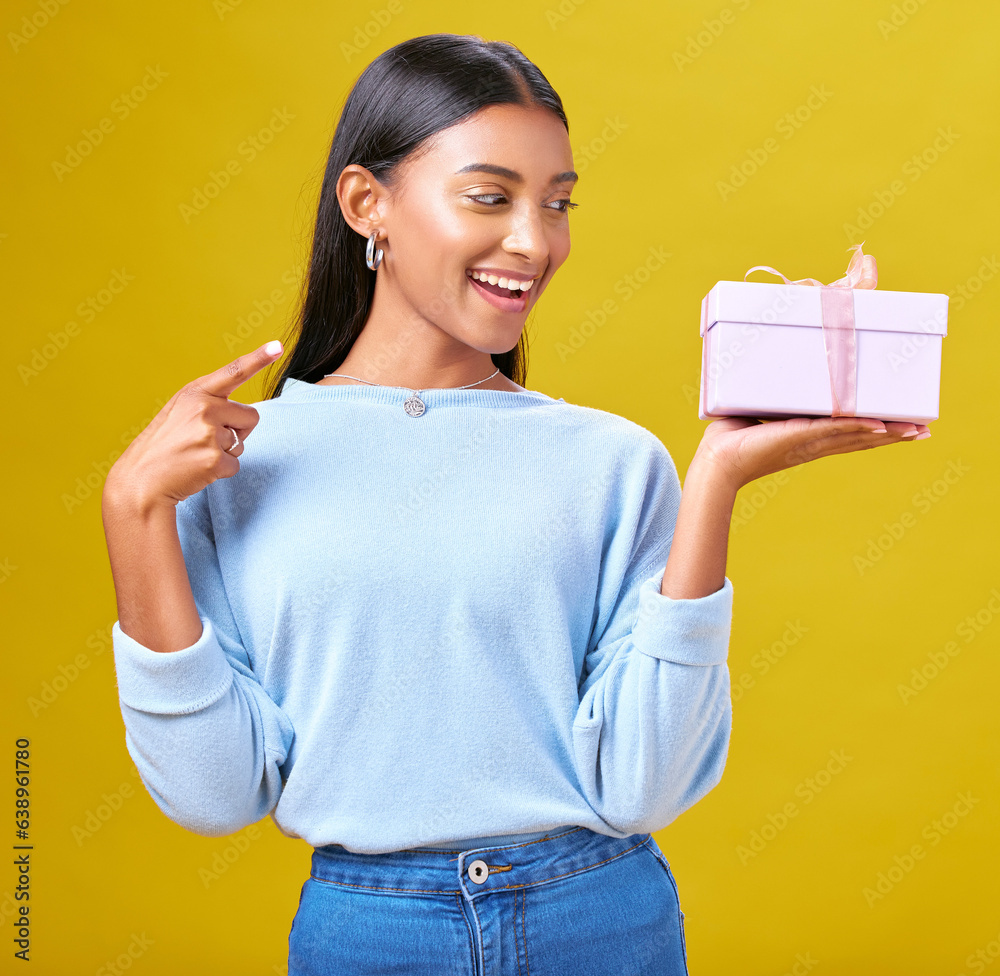 Woman, happy winner and gift box, presentation and prize, giveaway or shopping offer on yellow backg