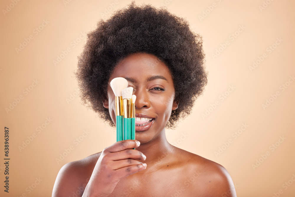 Portrait, makeup and a black woman with brushes on a studio background for wellness and foundation. 