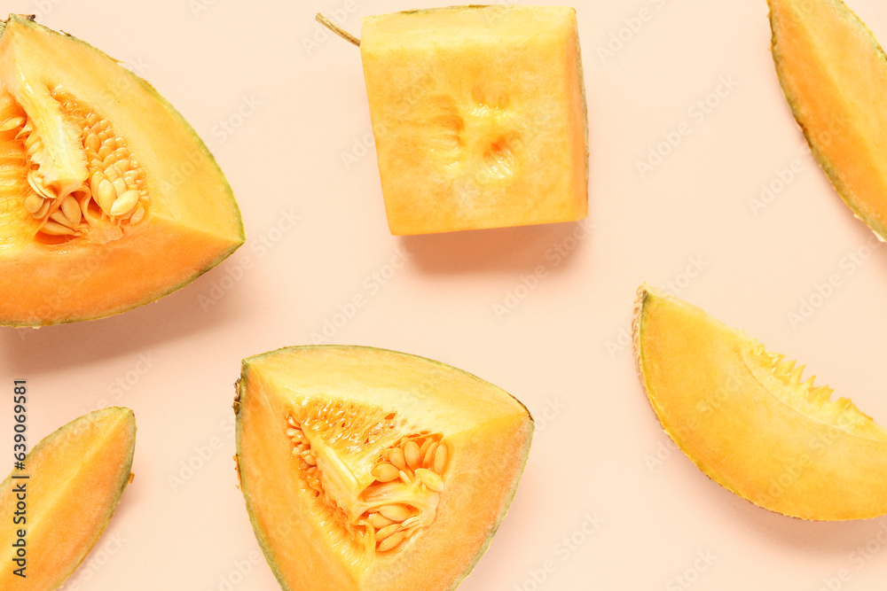 Pieces of sweet melon on pink background