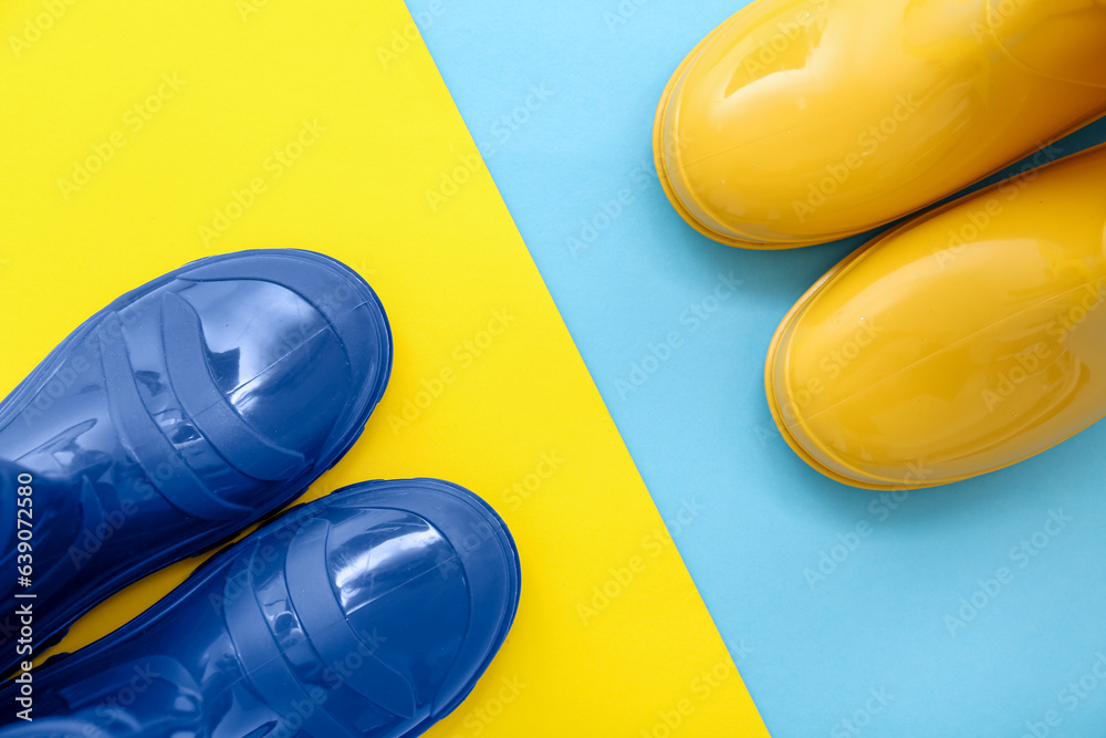 Different gumboots on colorful background