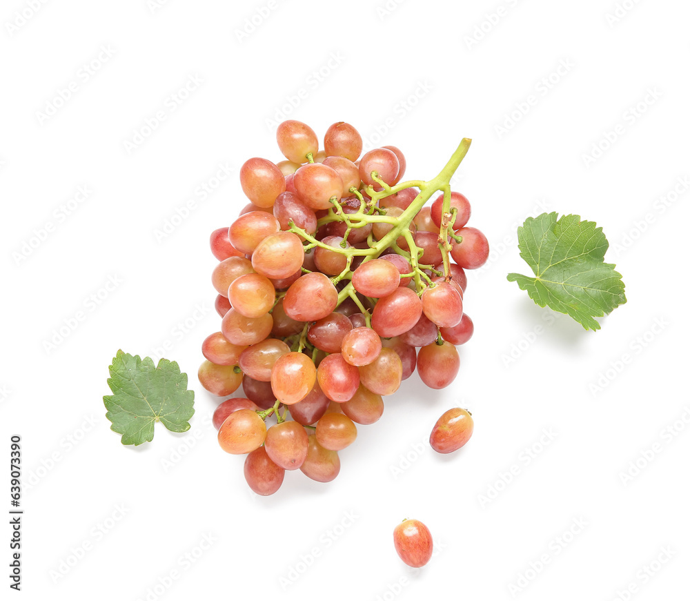 Tasty ripe grapes and leaves on white background