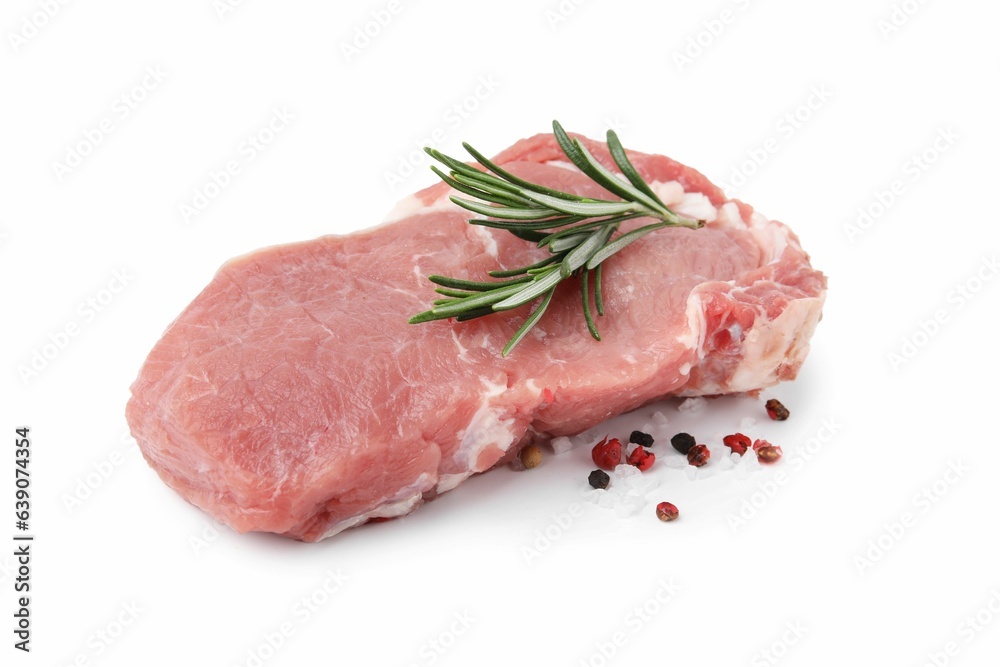 Fresh raw meat with rosemary and spices isolated on white