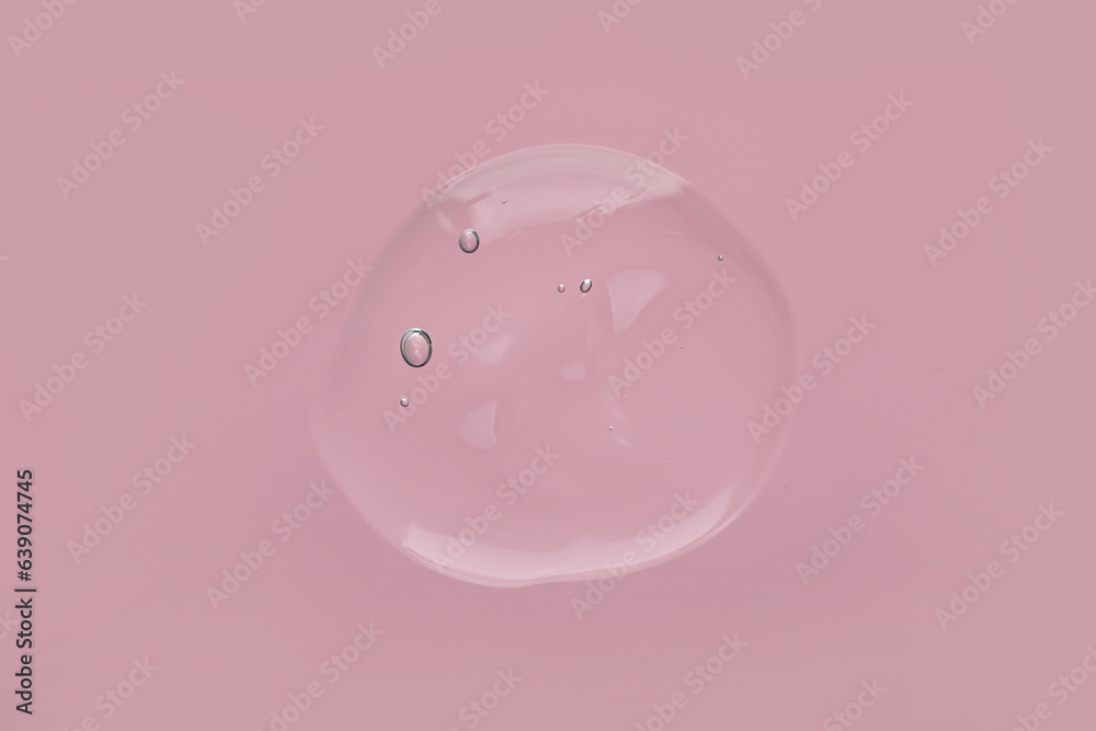 Sample of cleansing gel on pink background, top view. Cosmetic product