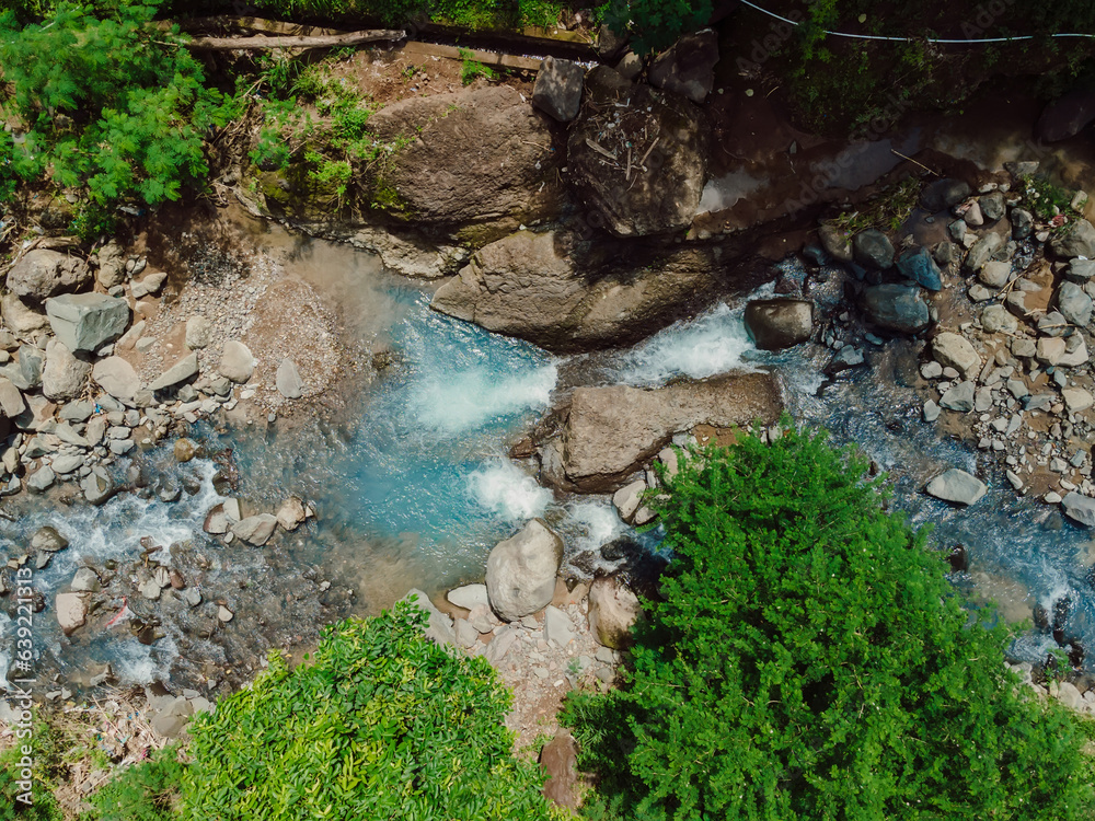 Mountain river with crystal water in Bali. Aerial view