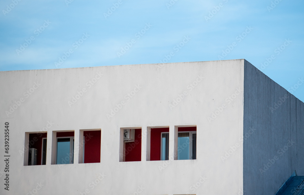 Multi-storey buildings, windows in the house, the sky of nature.