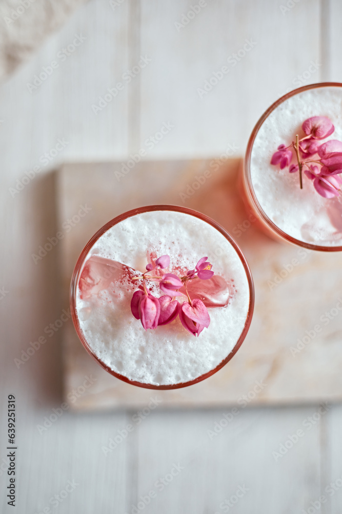 Thai style iced pink milk.Cold sweet drink Red Grenadien Sugar Syrup mix with milk and iced cube in 