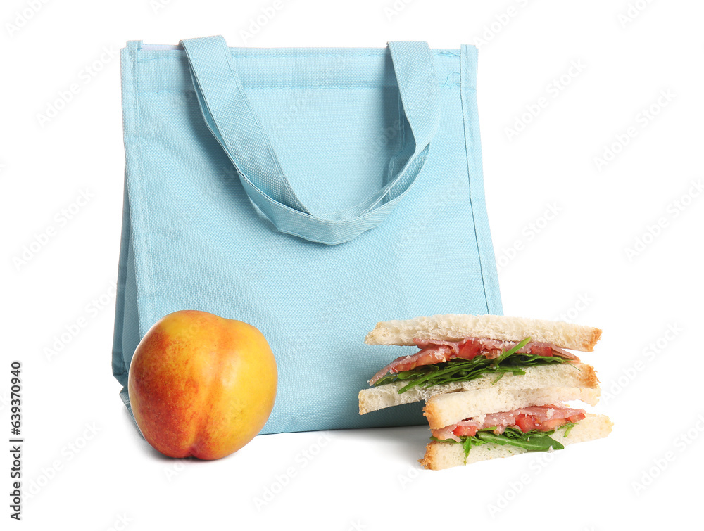 Lunch box bag with peach and sandwiches isolated on white background