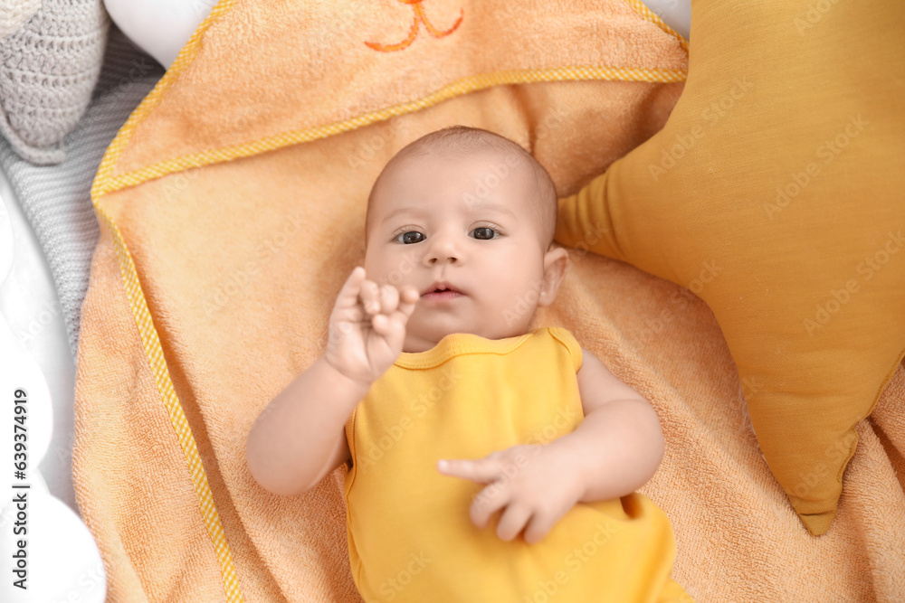 Cute baby lying in crib