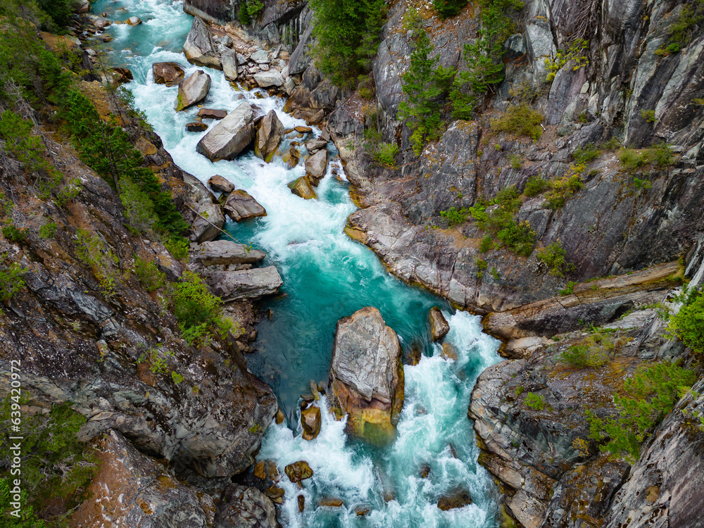 River in a Rocky Mountain Canyon. British Columbia, Canada. Aerial Nature Background