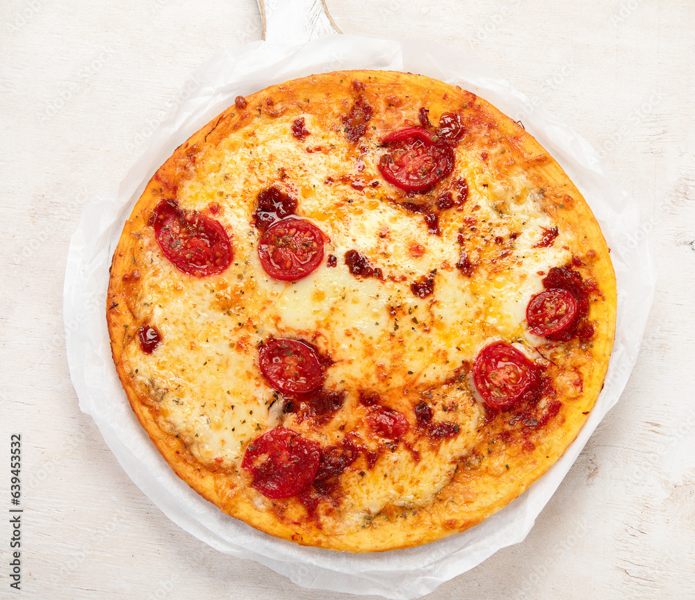 Italian pizza Margherita with cheese, tomato sauce and basil.