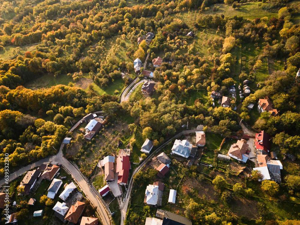 Drone shot of houses in a mountain village in the Carpathians