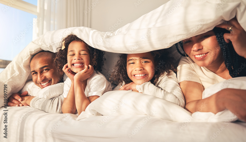 Happy family, bed and under blanket in home bedroom while comfortable, portrait and together. Africa