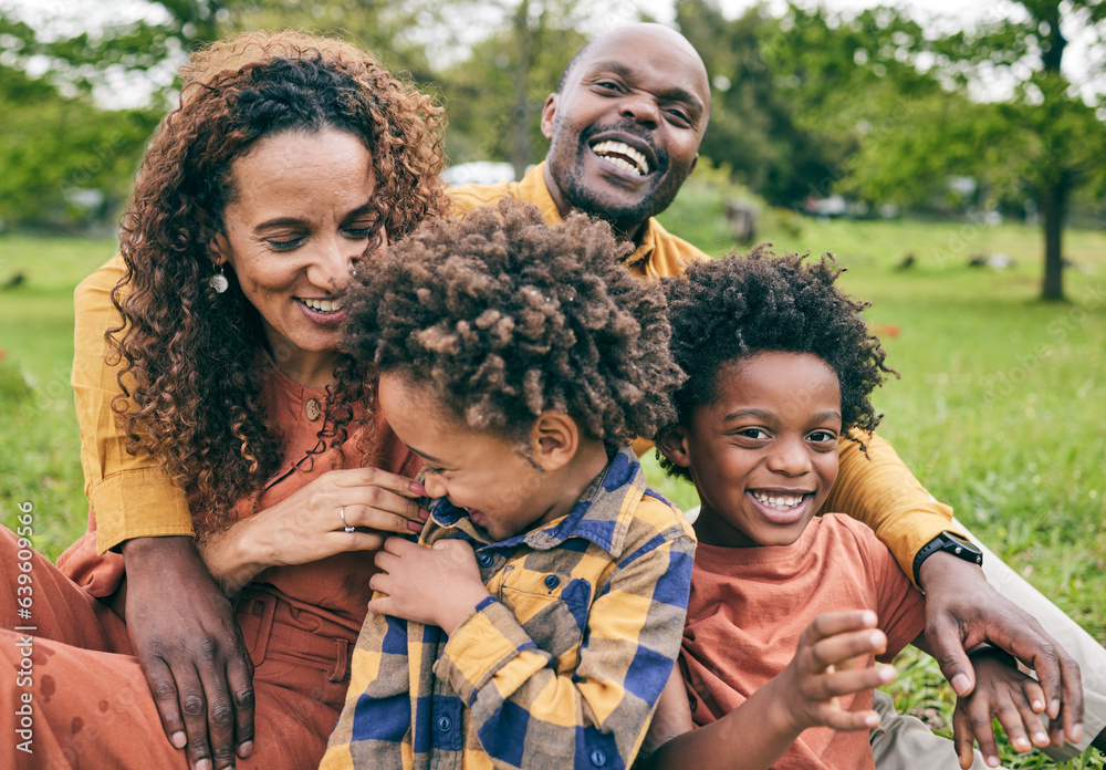 Happy black family, parents and children in a park in summer, smile and relax on grass field for lov