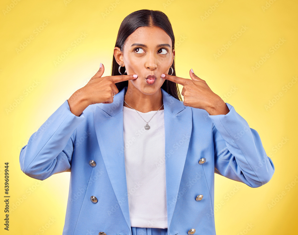 Face, fingers on cheek and a woman in studio for positive attitude, dimples and emoji. Indian model 