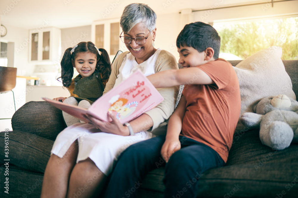 Happy kids, smile or grandmother reading a book for learning, education or storytelling on sofa at h