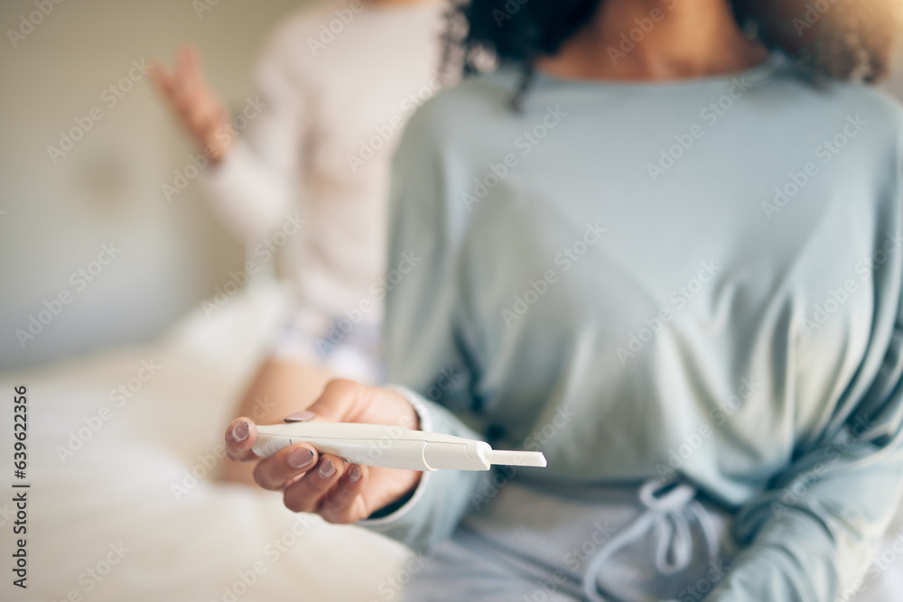 Hands, woman and bed with pregnancy test, closeup and home for results, planning or news to start fa