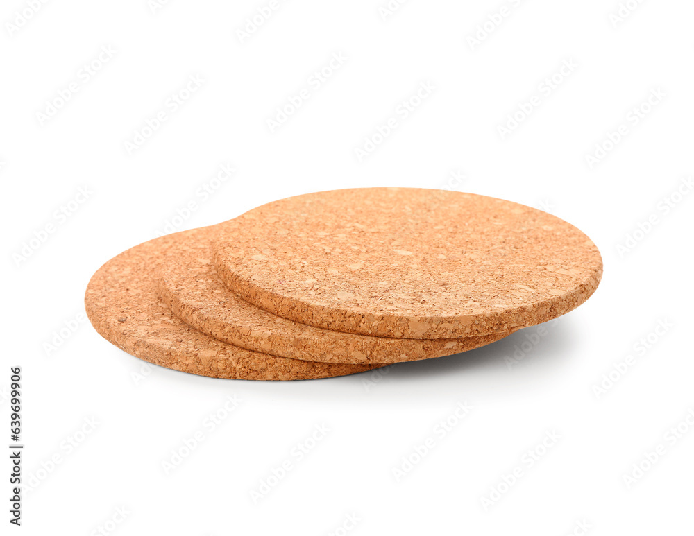 Round cork table coasters on white background