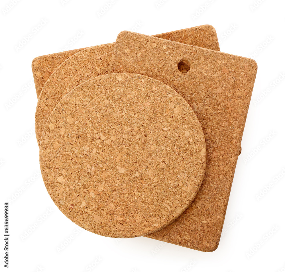 Set of cork table coasters on white background