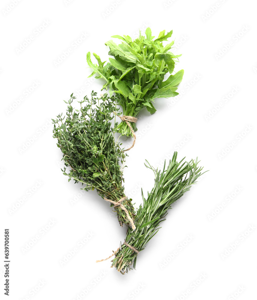 Bunches of fresh aromatic herbs isolated on white background