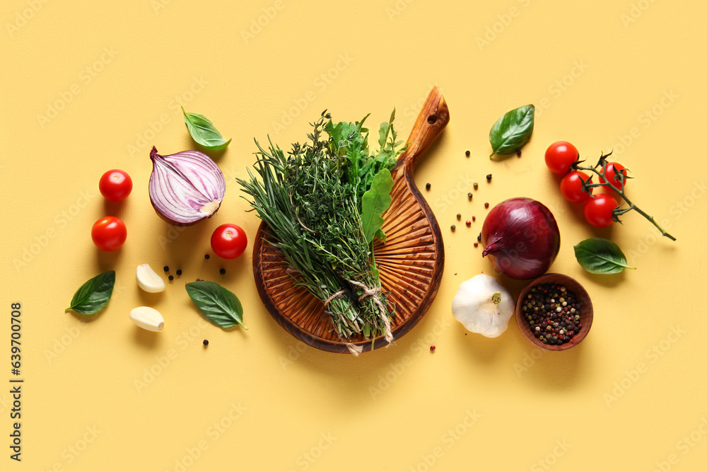 Composition with fresh herbs, vegetables and spices on color background