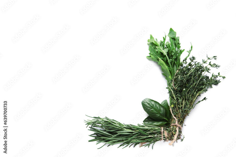 Composition with aromatic herbs on white background