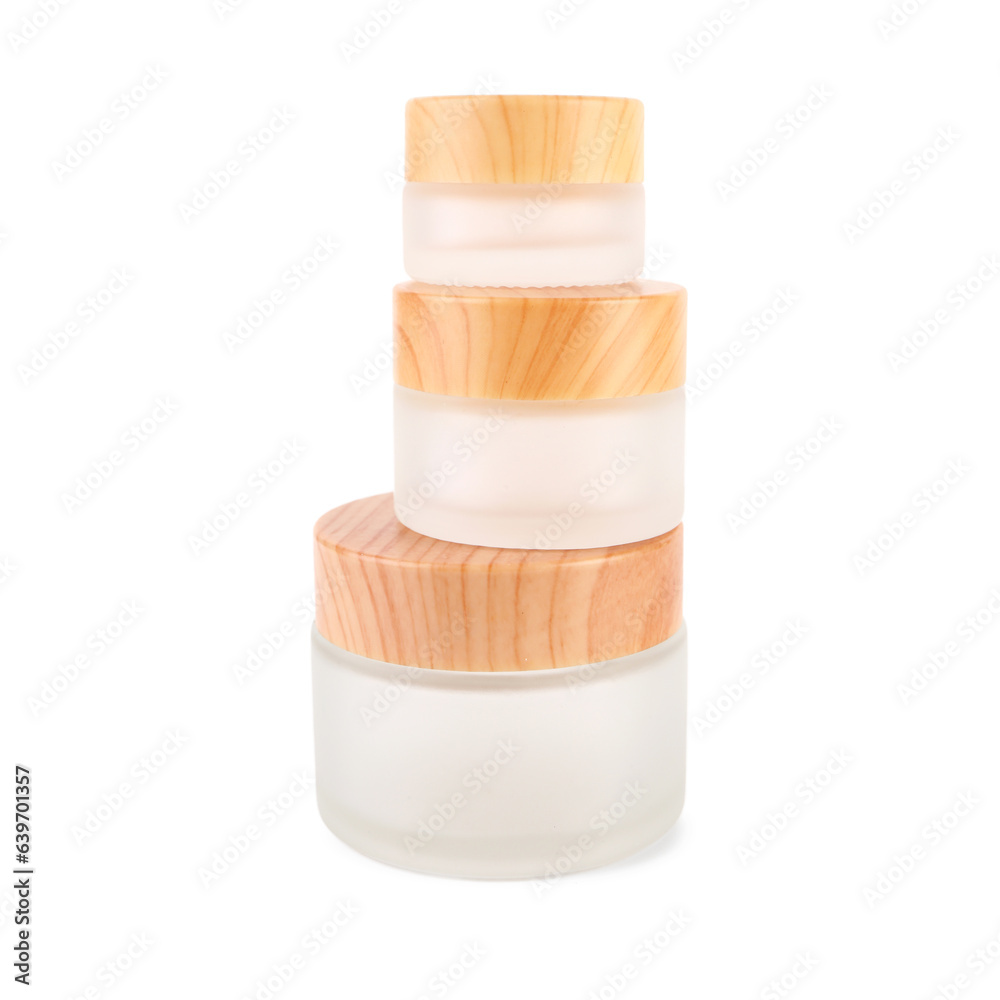 Set of cosmetic jars on white background