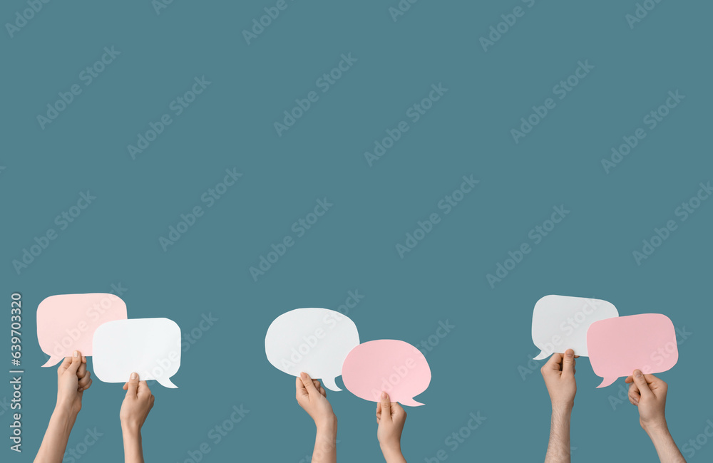 Different hands with speech bubbles on blue background