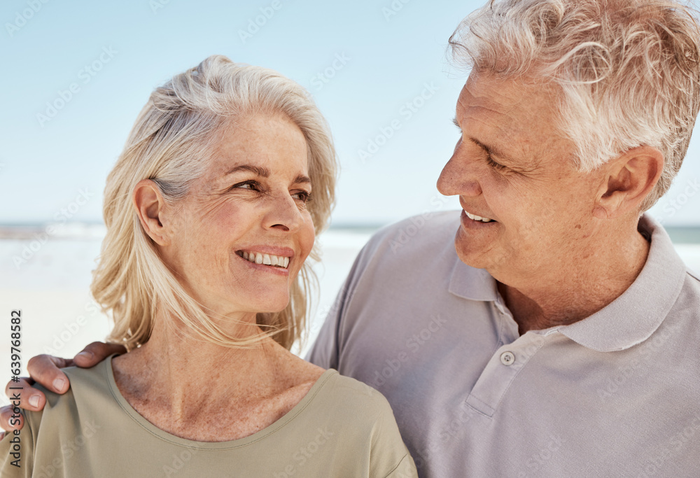 Happy, love and senior couple at the beach on romantic anniversary vacation, holiday or adventure. T