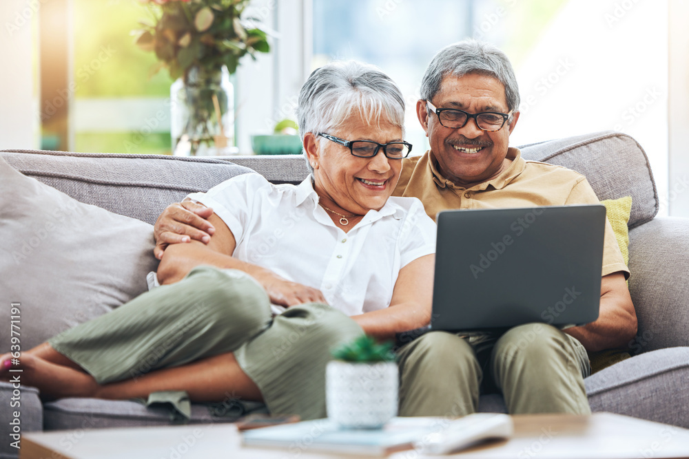 Laptop, happy and senior couple on sofa for watching movies, entertainment and streaming in living r