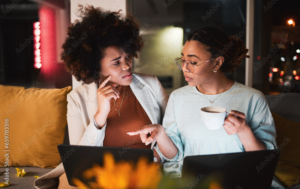 Women, laptop and talking at night for teamwork, collaboration and working late in office. Communica