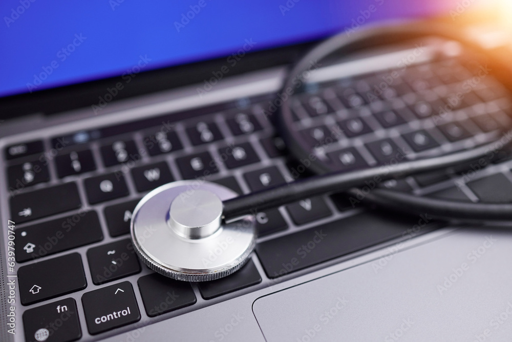 Computer, stethoscope and online for medical advice, professional, or expert in healthcare, cardiolo