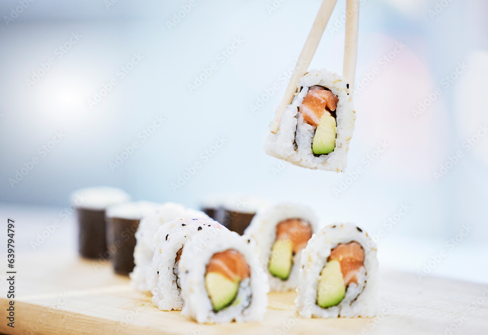 Sushi, closeup and food with fish for eating, salmon and rice with avocado, healthy and fine dining.