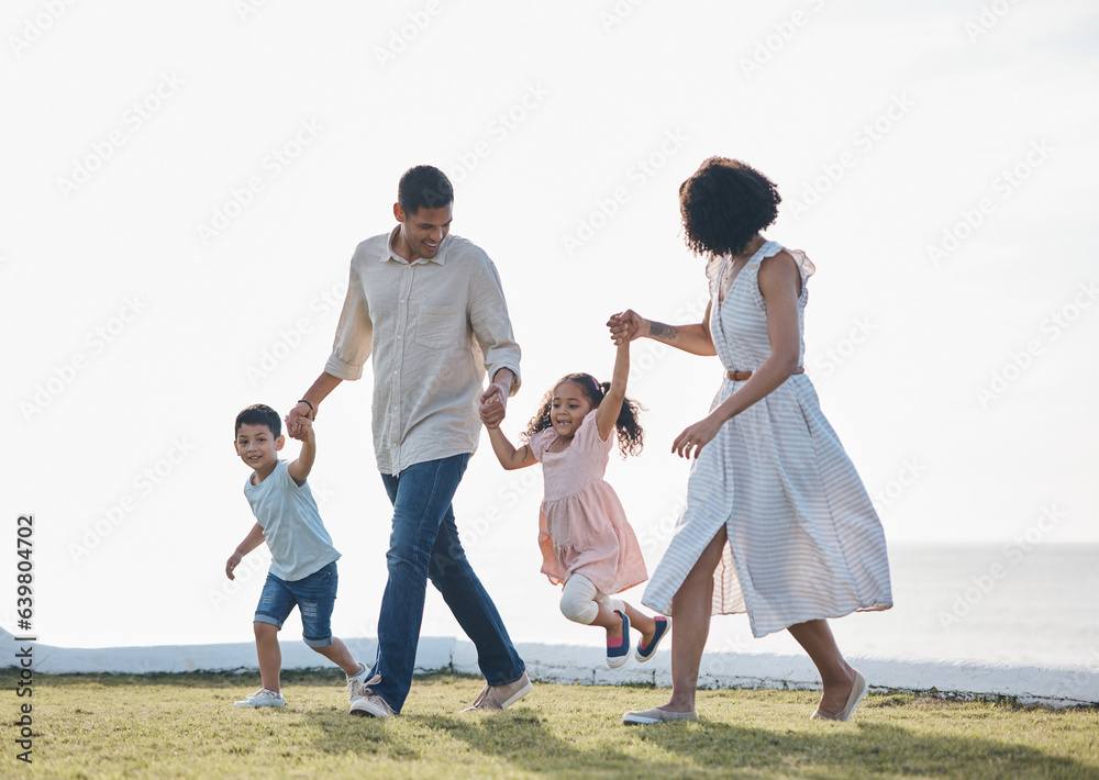 Happy family, holding hands and outdoor at a park with a love, care and happiness together in nature