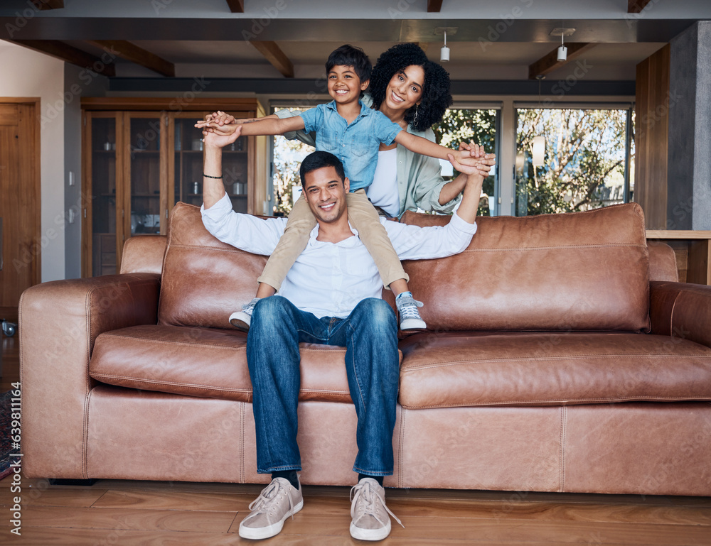 Happy, airplane and portrait with family on sofa for smile, bonding and peace on holiday. Love, care