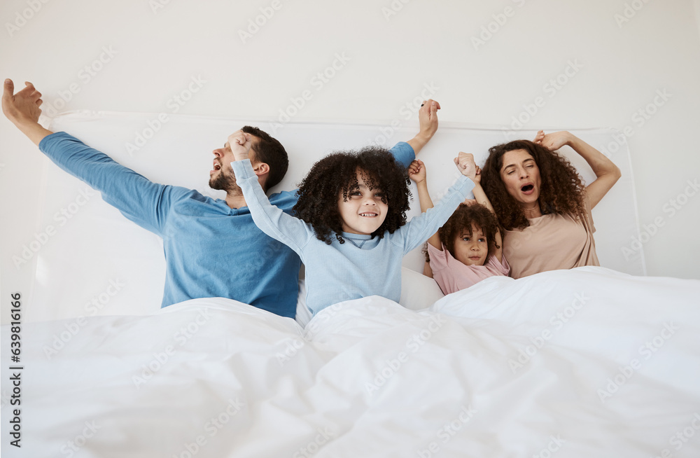 Family, bed and yawn in morning wake up, relax or sleep together with arms up at home. Calm parents,