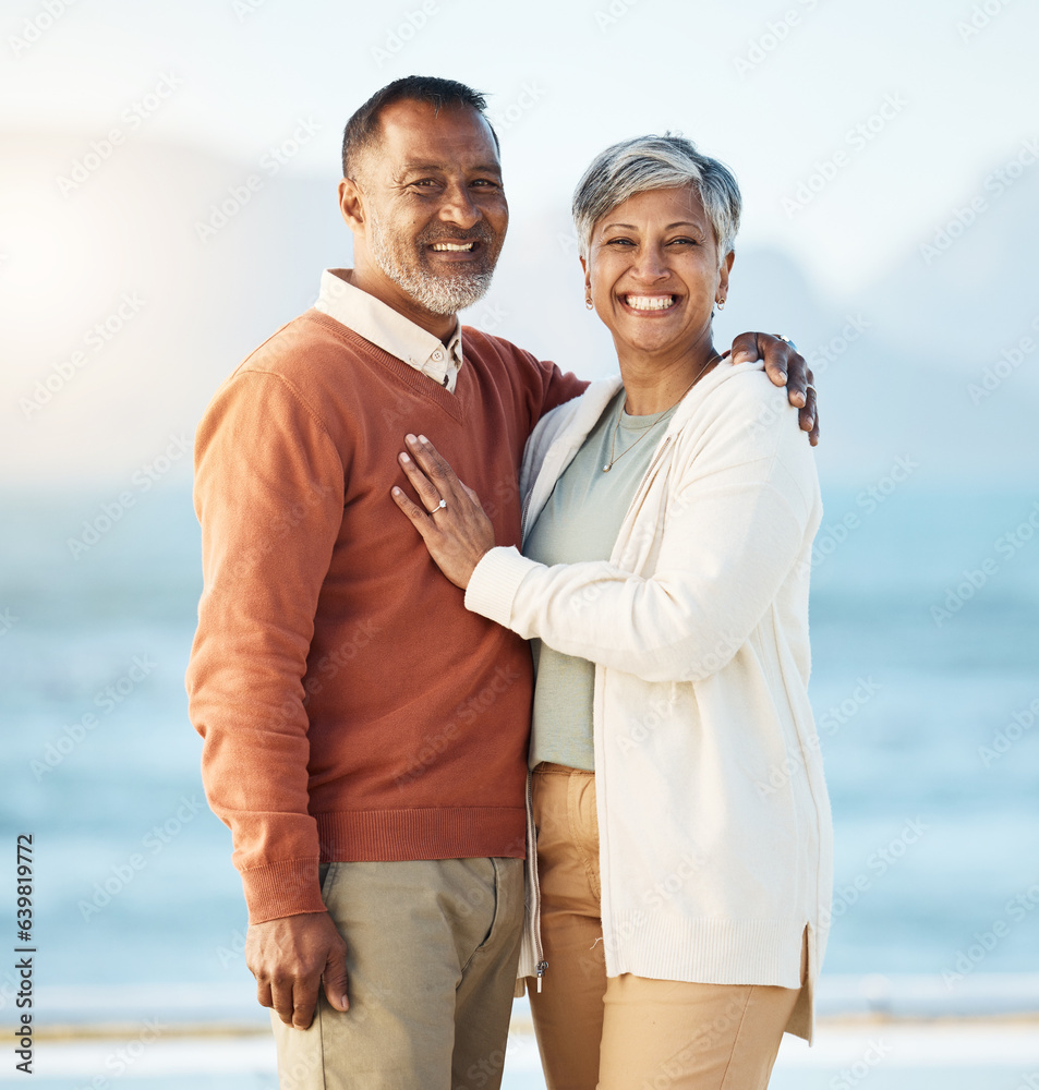 Senior couple, beach portrait and smile with hug, care and bonding for love, romance and vacation by