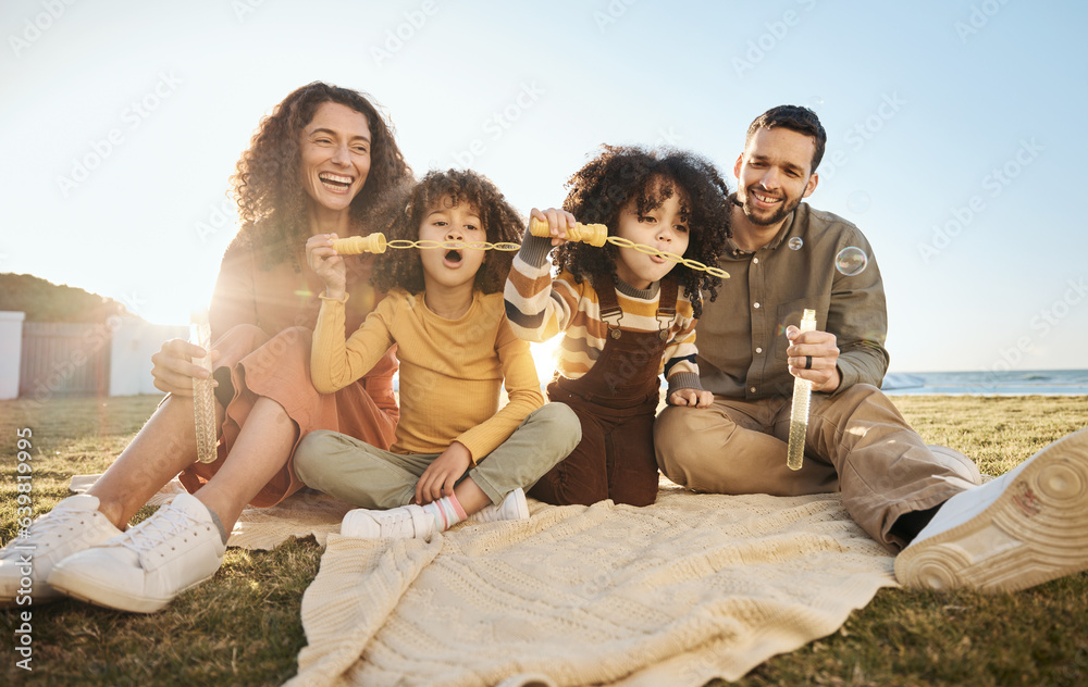 Parents, children and fun bubbles at picnic at beach vacation home with smile, love and relax. Mom, 