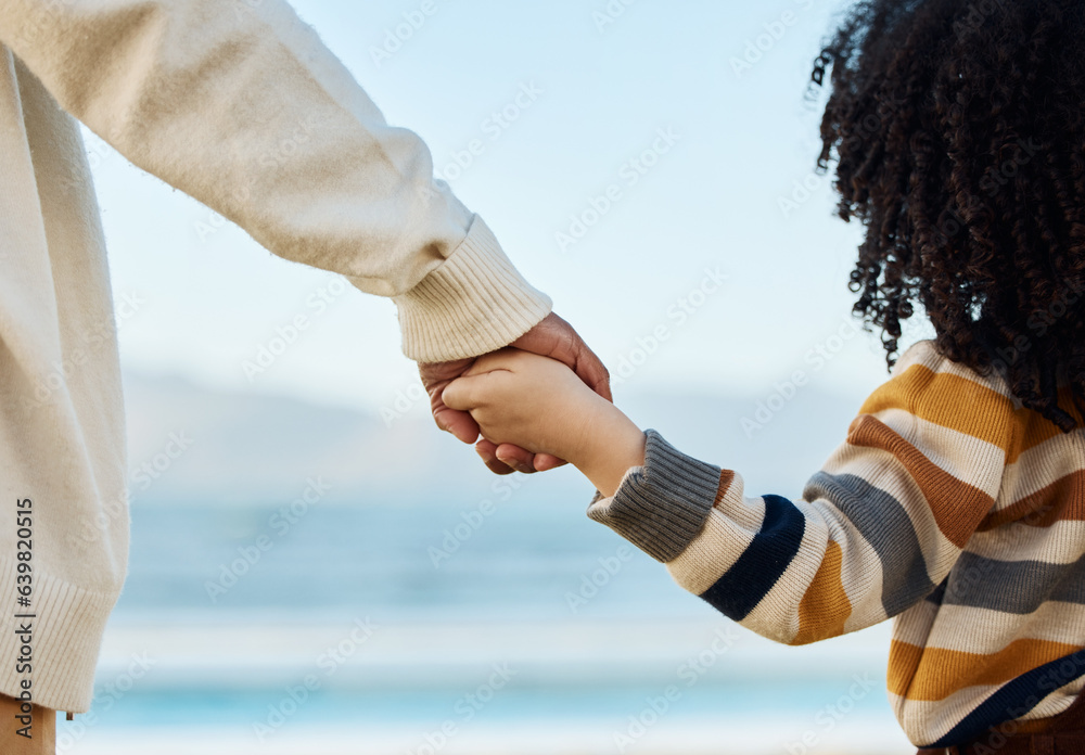 Family, holding hands and parent with a child on the beach while on summer vacation for travel toget