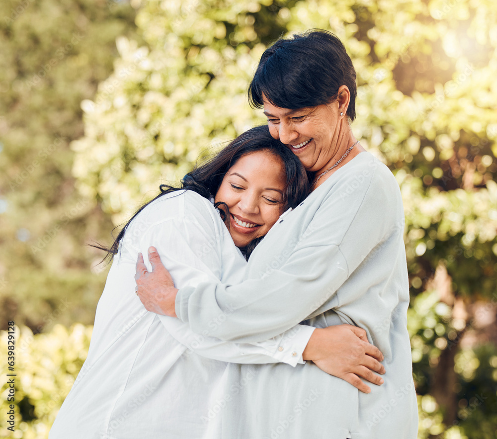 Mature woman, daughter and hug in garden with love on mothers day or women bonding with care for mom