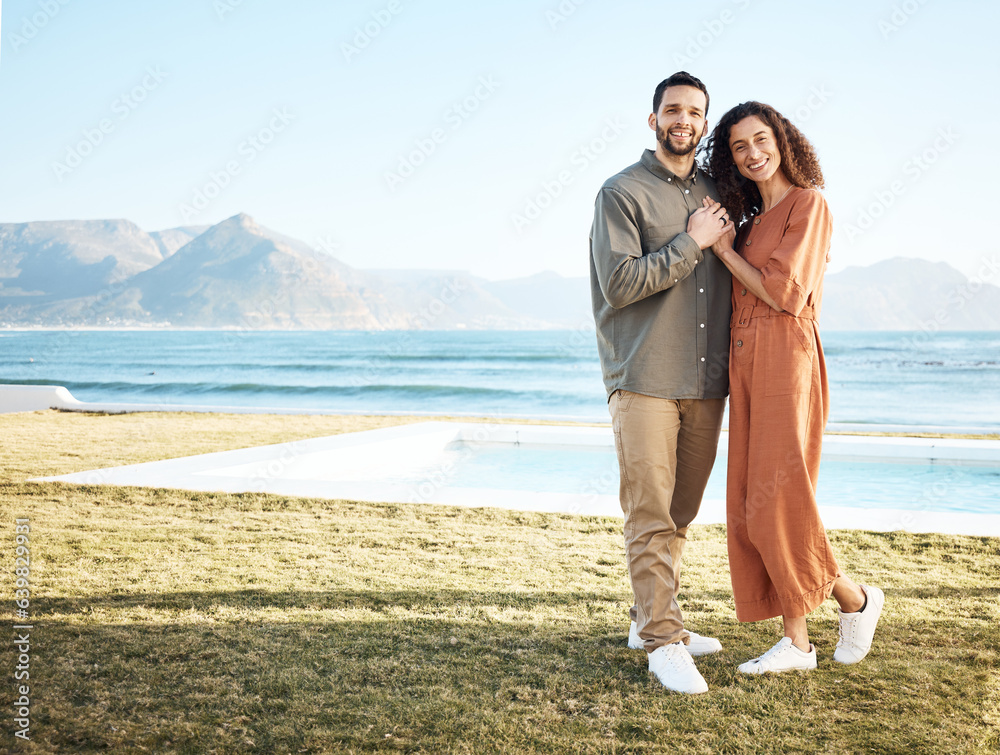 Couple, outdoor pool and portrait with love, garden and happy from travel by the ocean. Smile, hug a