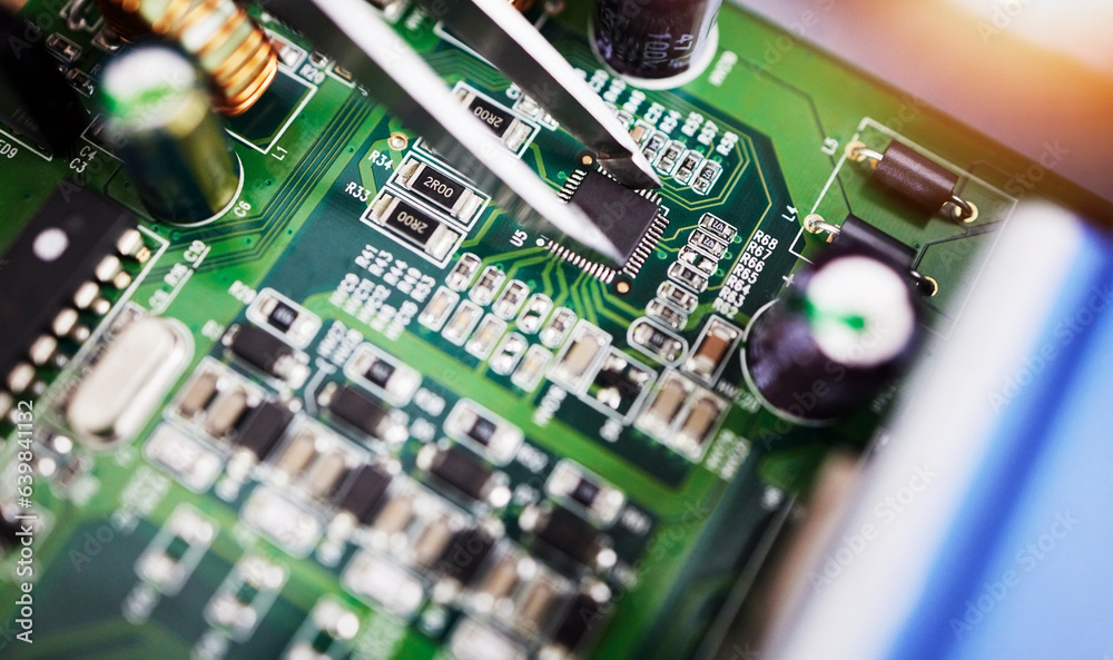 Motherboard, microchip and engineering closeup with electric maintenance of circuit board. Developer