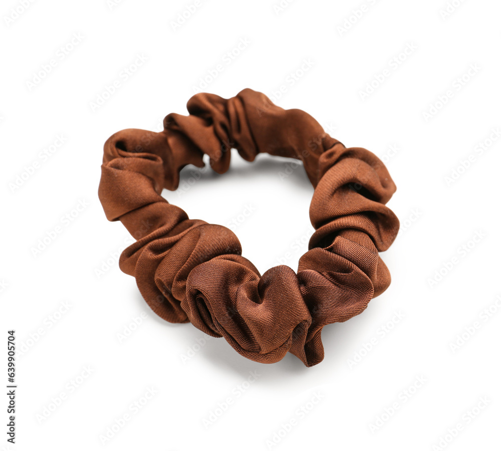 Brown silk scrunchy on white background