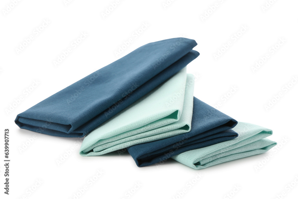 Stack of folded clean napkins on white background