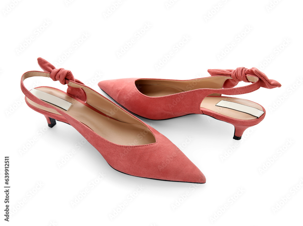 Stylish pink shoes on white background