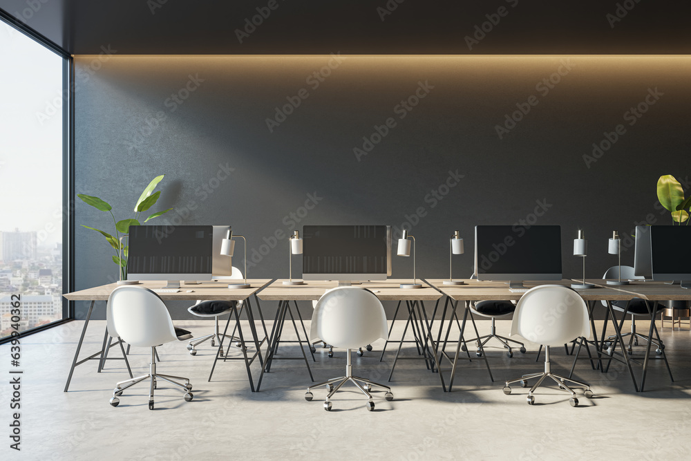 Modern coworking office interior with computer monitors, window and city view and furniture. 3D Rend