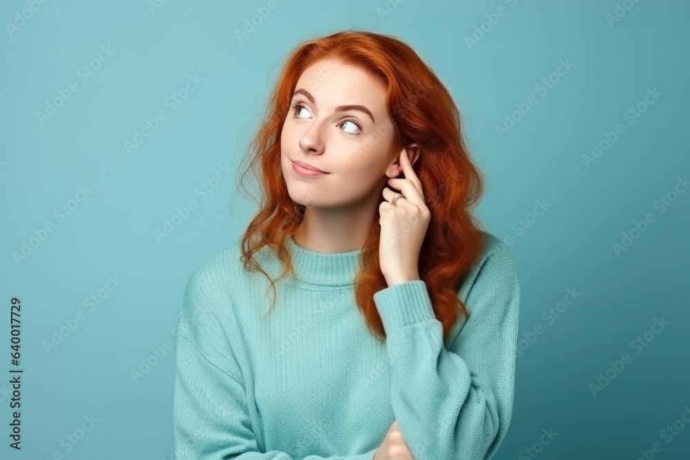 Woman with red hair thinking about something