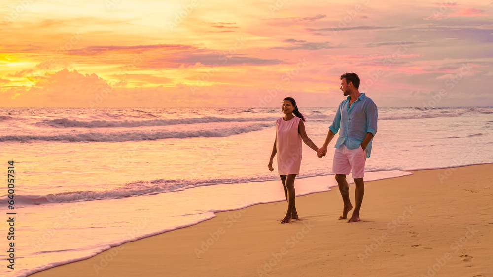 sunset on the beach of Phuket Thailand, and colorful sunset during monsoon rain season at the beach.